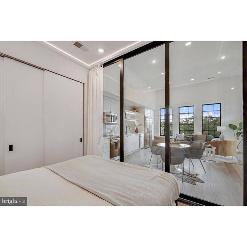 THE SLIDING DOOR COMPANY 3 Panel, Sliding Room Divider, Clear Glass and Aluminum Frame on triple track.