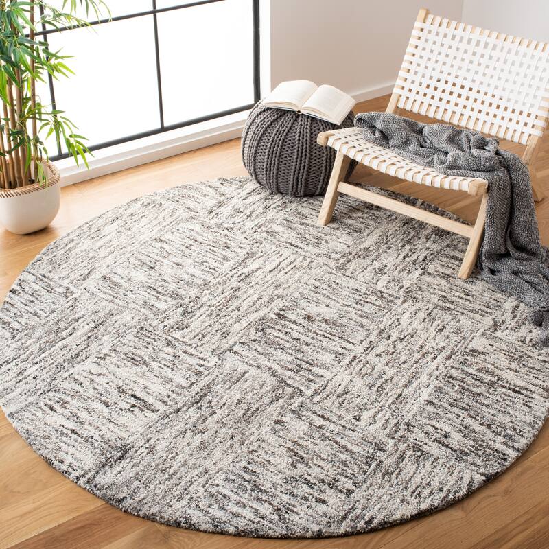 SAFAVIEH Handmade Abstract Hristina Modern Viscose Rug - 6' Round - Ivory/Charcoal
