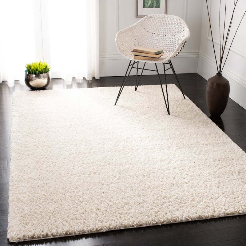 SAFAVIEH August Wilhelma Shag Solid 1.2-inch Thick Area Rug - 9' x 12' - Ivory