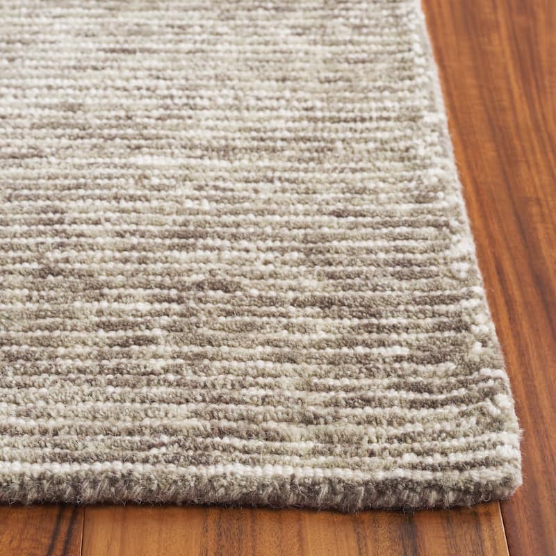 SAFAVIEH Handmade Ebony Sora Wool Rug