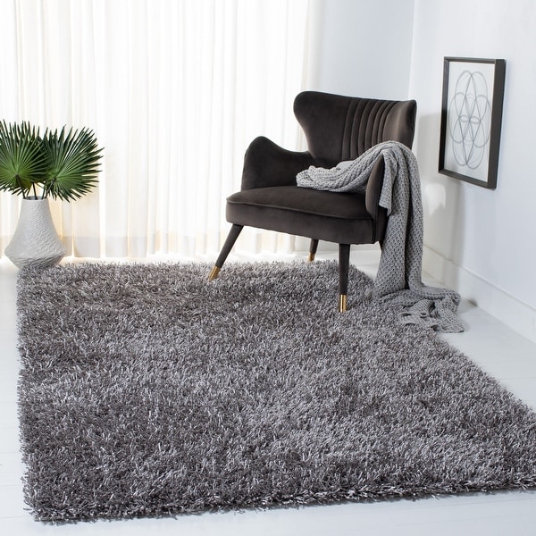 Safavieh Handmade New Orleans Shag Triin Solid Polyester Rug. Opens flyout.