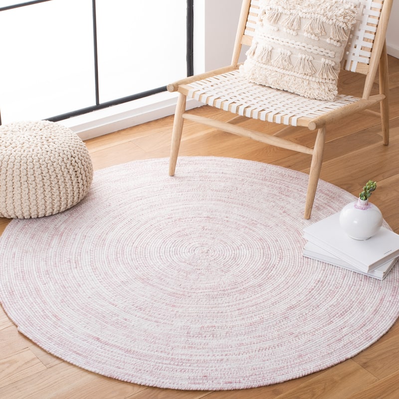 SAFAVIEH Handmade Braided Arnoldina Round Rug - 6' Round - Ivory/Pink