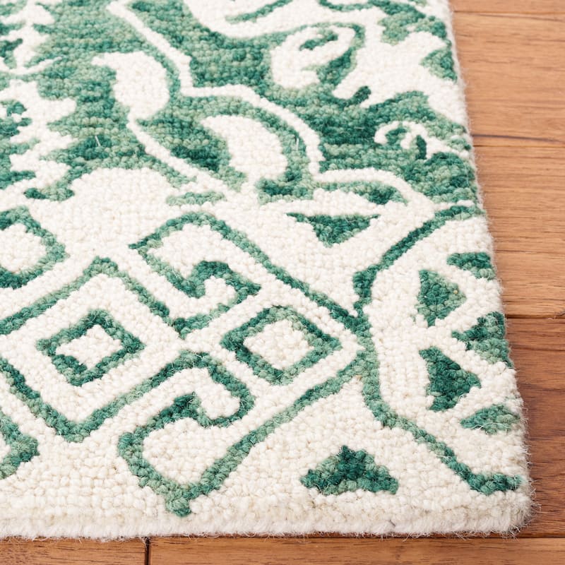 SAFAVIEH Handmade Dip Dye Nicki Floral Wool Rug