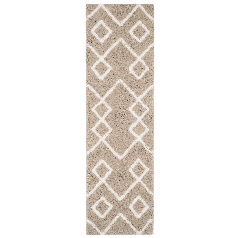 SAFAVIEH Handmade Toronto Shag Welmoet Polyester Rug