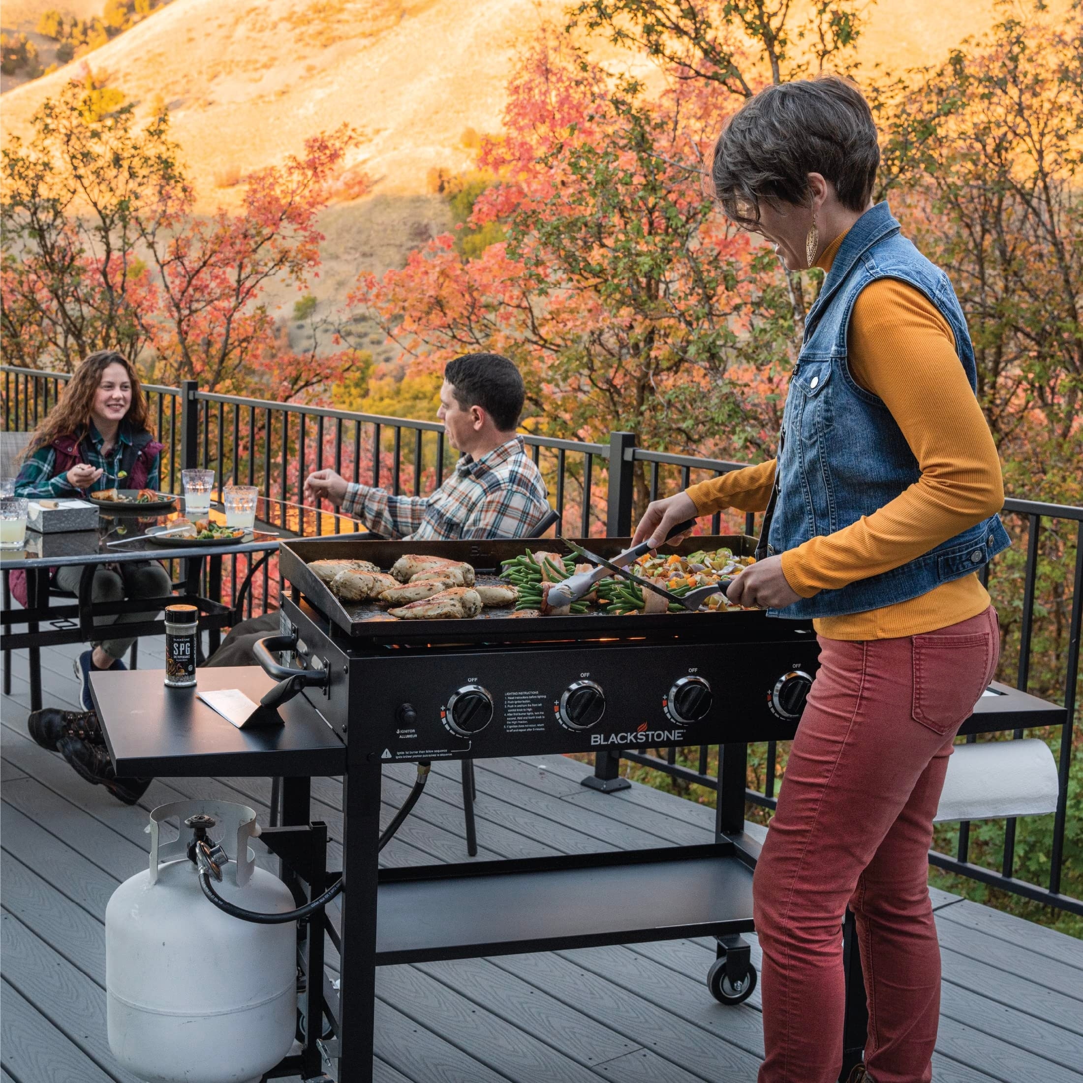 Cooking Station 4 Burner Propane Fuelled Outdoor Flat Top Gas Griddle with Built in Cutting Board Garbage Holder and Side Shelf