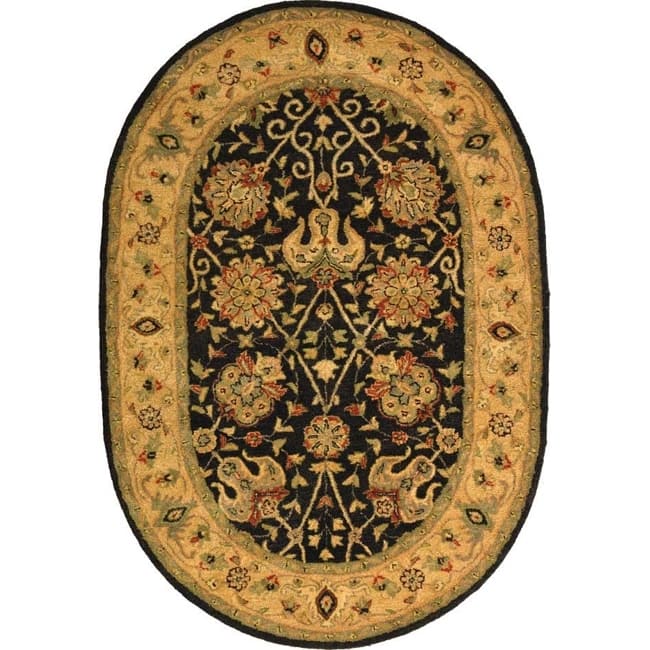 SAFAVIEH Handmade Antiquity Zuriñe Traditional Oriental Wool Rug - 7'6" x 9'6" Oval - Black