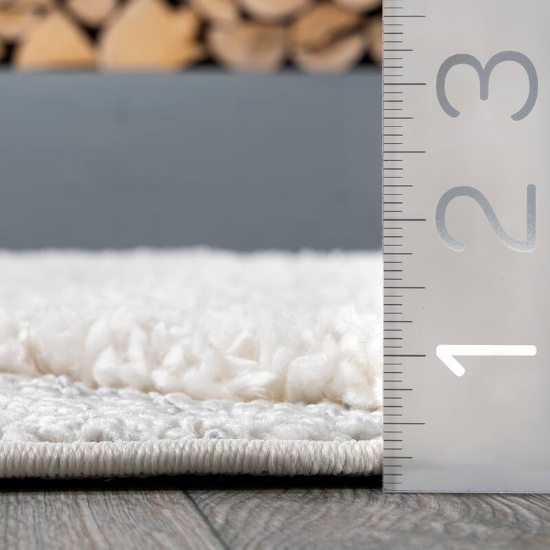 Nuloom Dae Geometric High/Low Tasseled Area Rug