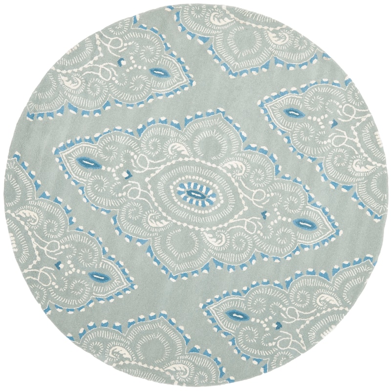 SAFAVIEH Handmade Wyndham Geanina Modern Wool Rug - 7' Round - Blue/Ivory