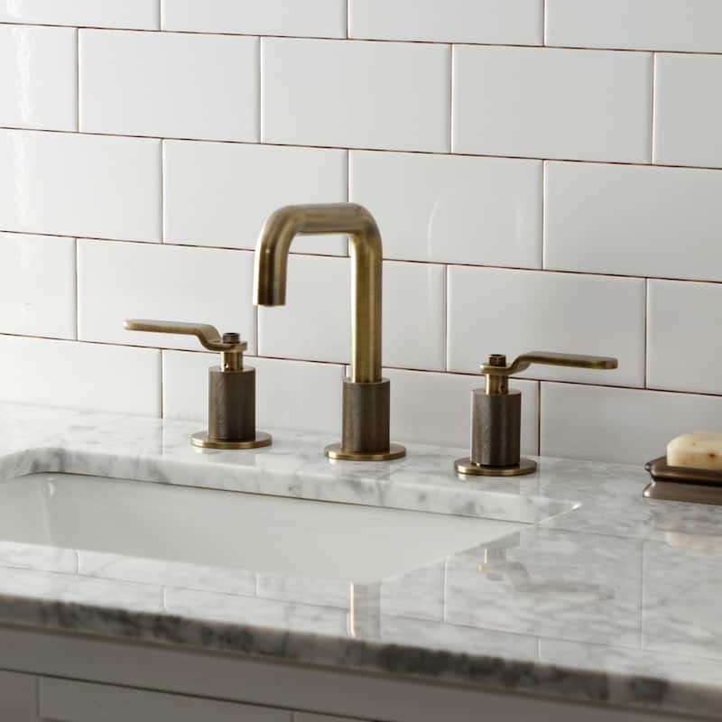 Kingston Brass Whitaker Two-Handle 3-Hole Deck Mount Widespread Bathroom Faucet with Push Pop-Up