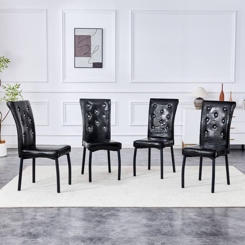 A set of 4 white and black vintage crocodile leather cushioned dining chairs, featuring crystal clasp design and leather