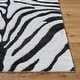 preview thumbnail 14 of 15, Livabliss Nomadic Animal Print Plush Area Rug