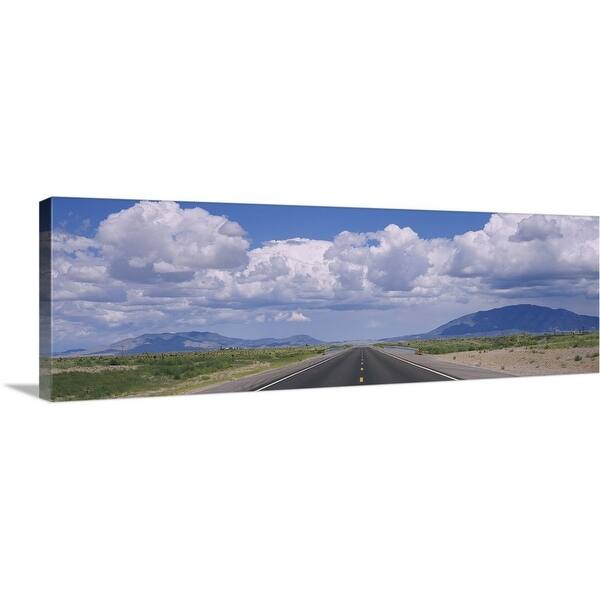 "An empty road running through a landscape, Highway 54, New Mexico