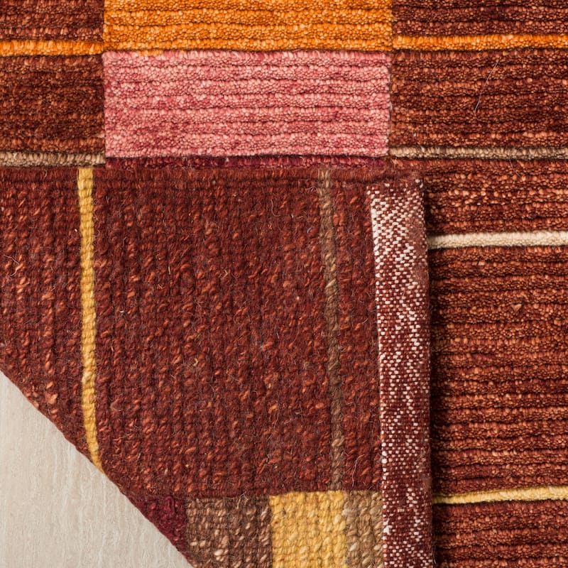 SAFAVIEH Couture Hand-knotted Tibetan Fayge Modern Wool Rug