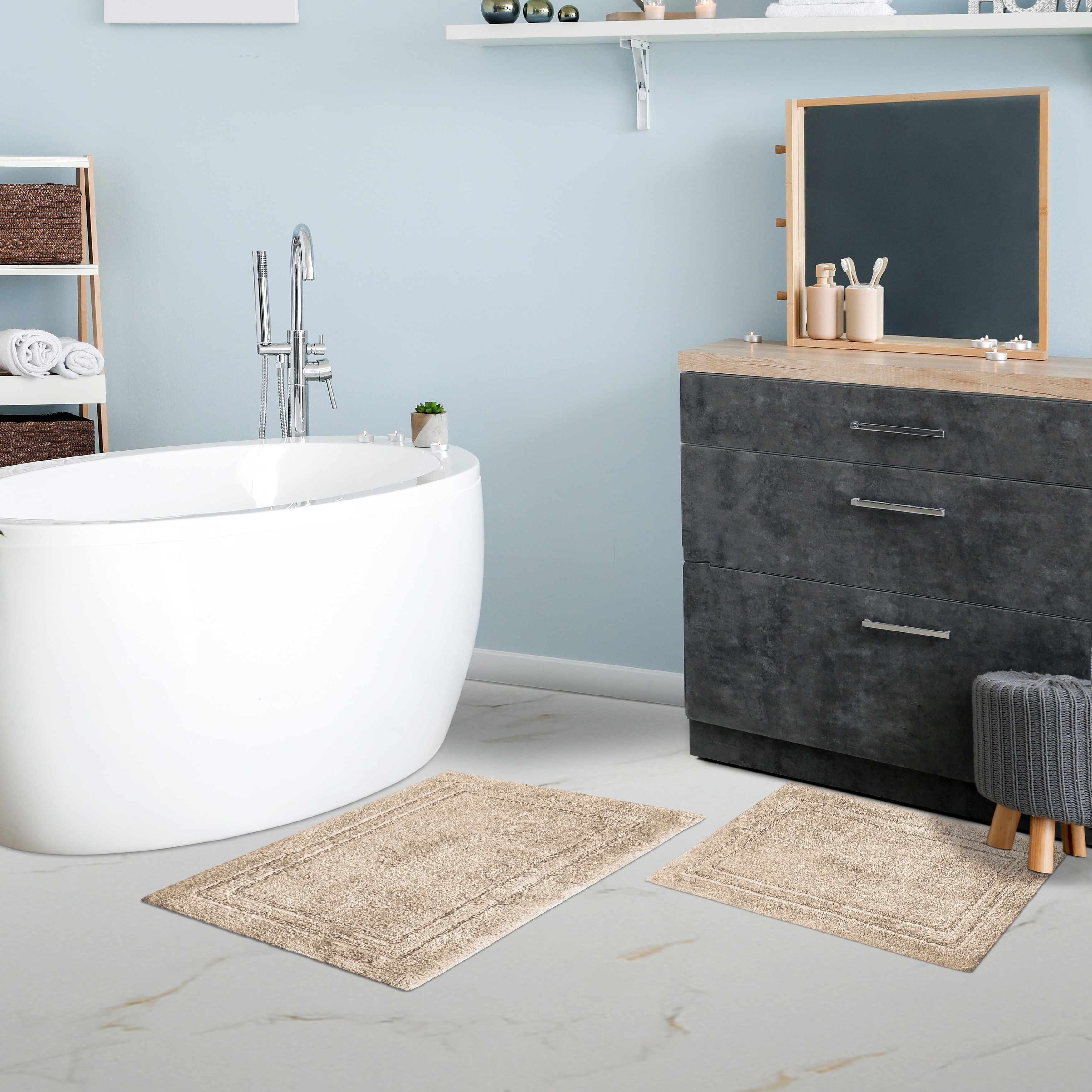 https://ak1.ostkcdn.com/images/products/is/images/direct/5870a25add3e4bc26783979fdaba3d4a0660b024/Miranda-Haus-Cotton-Solid-Non-slip-Backing-Bath-Rug-%28Set-of-2%29.jpg