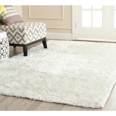 SAFAVIEH Handmade South Beach Leonella Shag Solid Polyester Rug