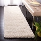 preview thumbnail 17 of 83, SAFAVIEH Fontana Shag Kimberlie Solid 2-inch Thick Rug 2'3" x 10' Runner - Creme - Runner