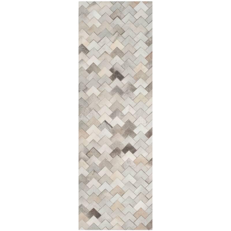 SAFAVIEH Handmade Studio Leather Momo Modern Leather Rug