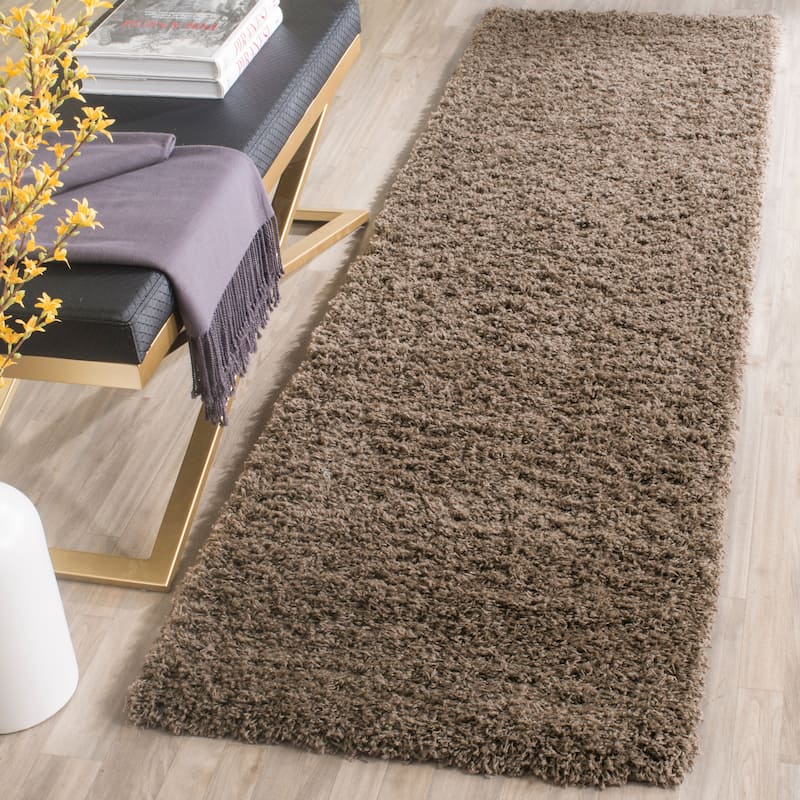 SAFAVIEH Laguna Shag Verdiana Solid Color 2-inch Thick Rug.