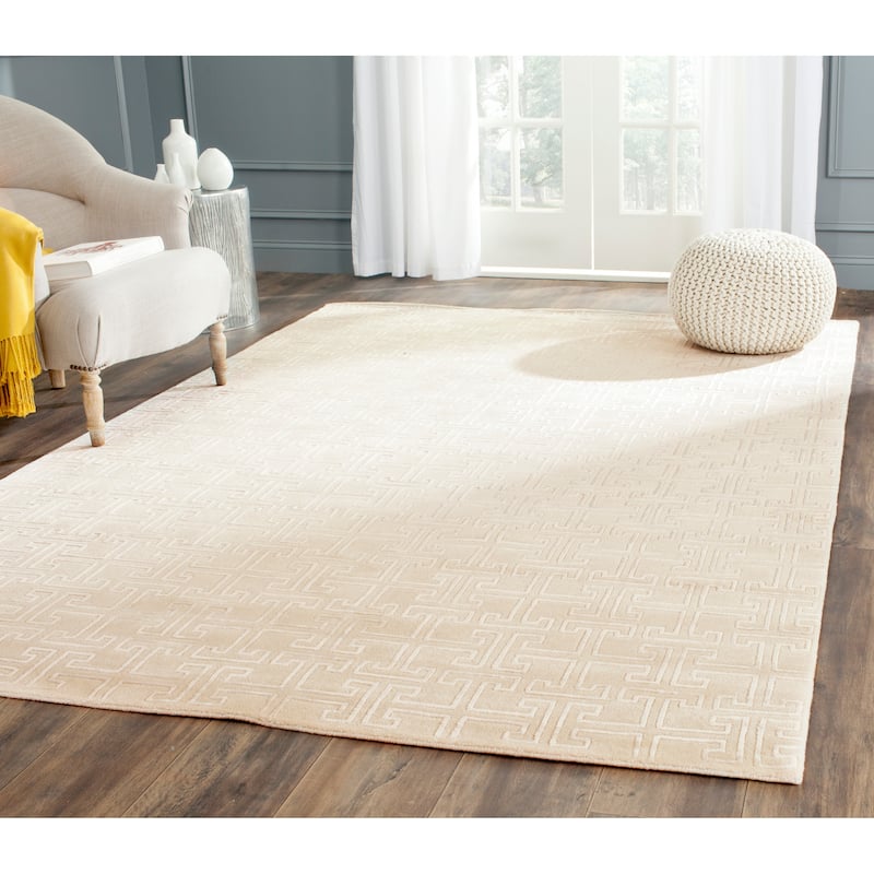 SAFAVIEH Couture Hand-knotted Tibetan Getta Modern Wool Rug - 9' x 12' - Ivory/White