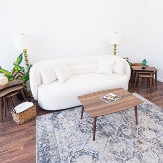 Ruminia Center Table in Walnut