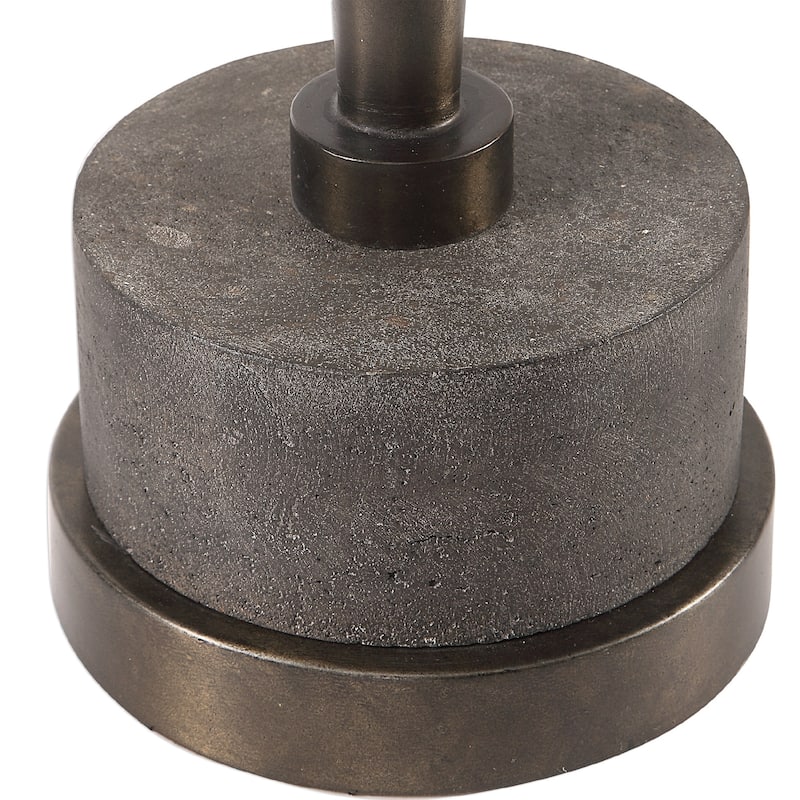 21.75" bronzed metal cylindrical accent table on a gray concrete base