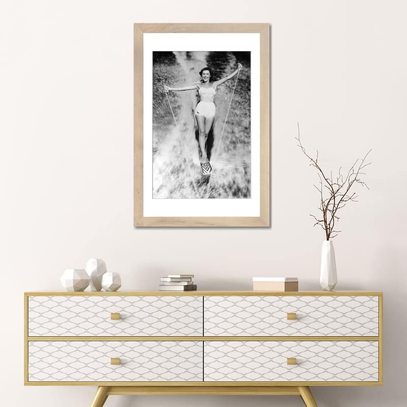 iCanvas "1950s Smiling Woman In White Two Piece Bathing Suit Aquaplaning Water Skiing Looking At Camera" by Vintage Images