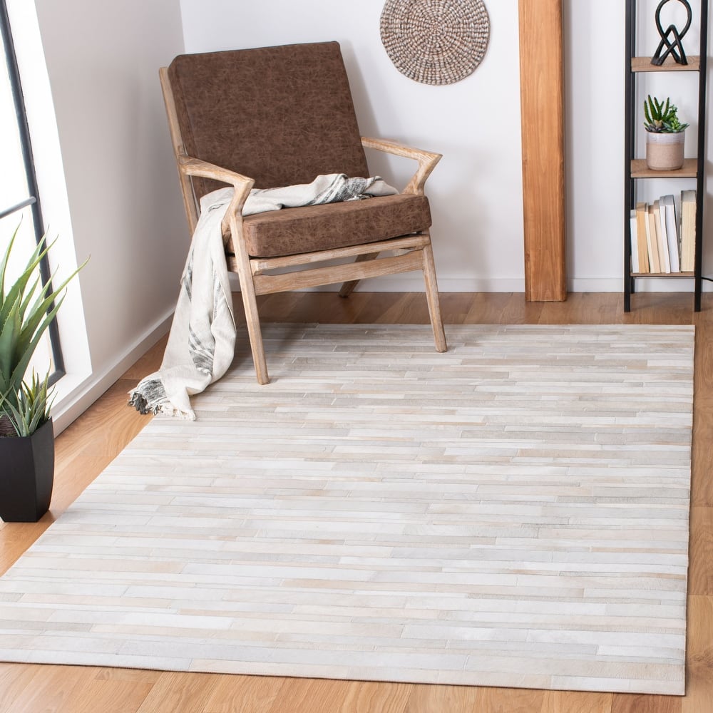 SAFAVIEH Handmade Studio Leather Daniele Natural Hide Leather Rug