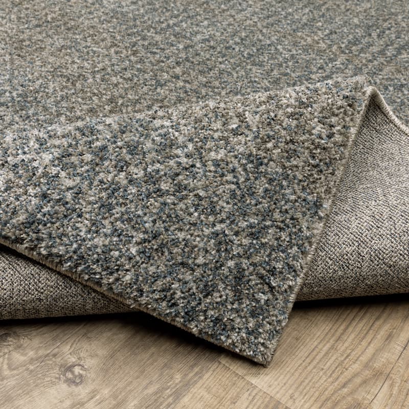 Azura Mottled Geometric Blue/Gray Area Rug