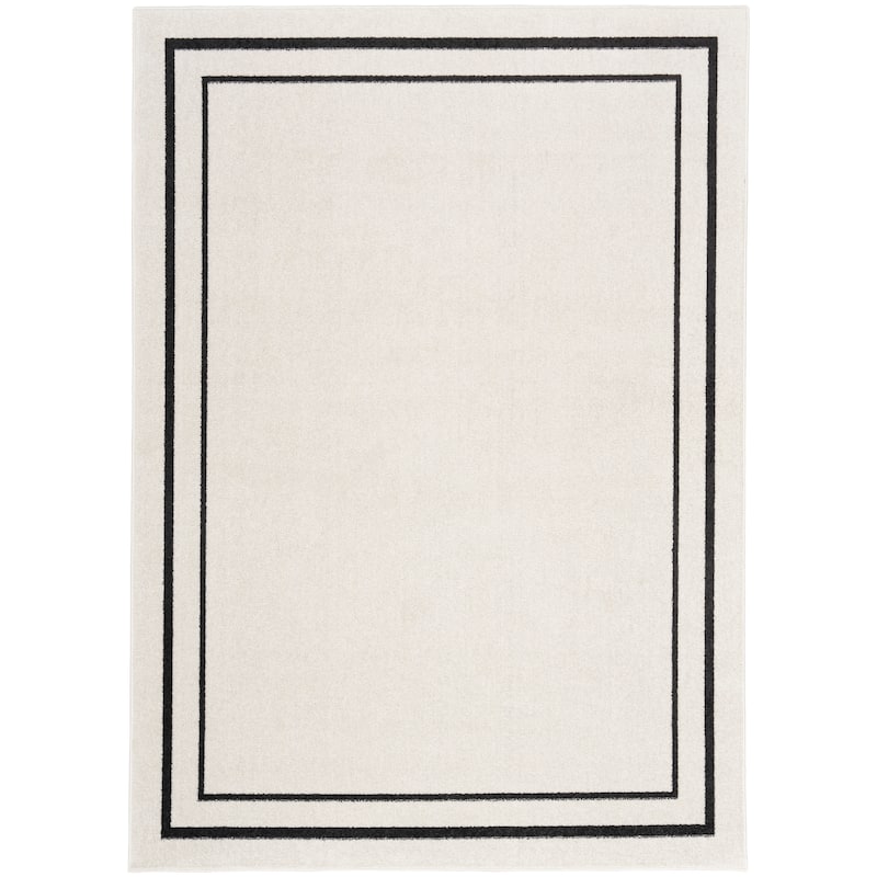 Nourison Sandy Indoor / Outdoor Solid Area Rug - 5' x 7' - Ivory/Black