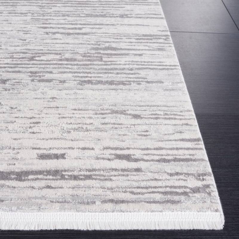 SAFAVIEH Diamond Einfrid Modern Abstract Fringe Rug
