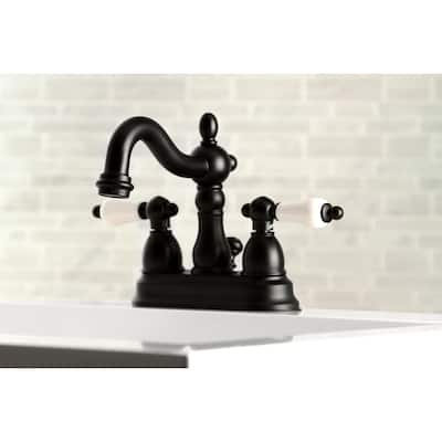 Kingston Brass Heritage Two-Handle 3-Hole Deck Mount 4 in. Centerset Bathroom Faucet