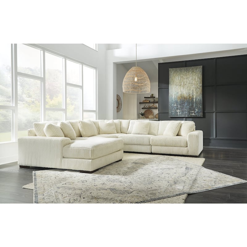 Signature Design by Ashley Lindyn Ivory 5-Piece Sectional with Ottoman - 133" W x 133" D x 38" H - Ivory - Left Facing