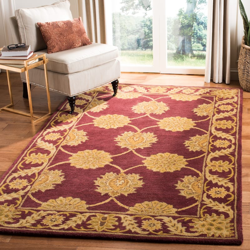 SAFAVIEH Handmade Heritage Lehte Traditional Oriental Wool Rug - 7'6" x 9'6" - Maroon