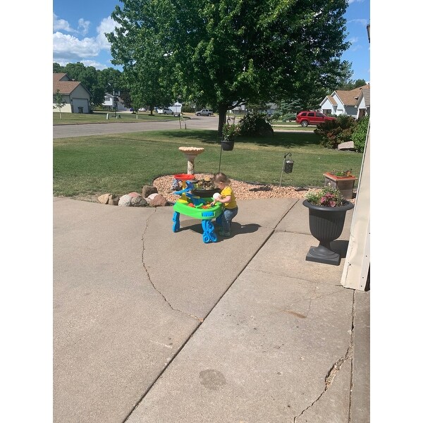 sand and water table with fish pond