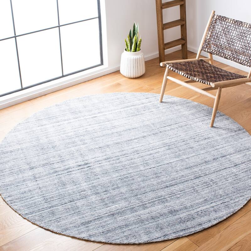 SAFAVIEH Handmade Mirage Tybritt Modern Wool/ Viscose Rug - 7' Round - Ivory/Grey