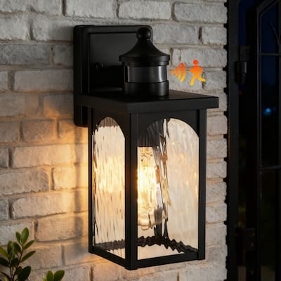 12 in. 1-Light Matte Black Motion Sensing Dusk to Dawn Outdoor Hardwired Wall Lantern Sconce with Clear Water Wave Glass