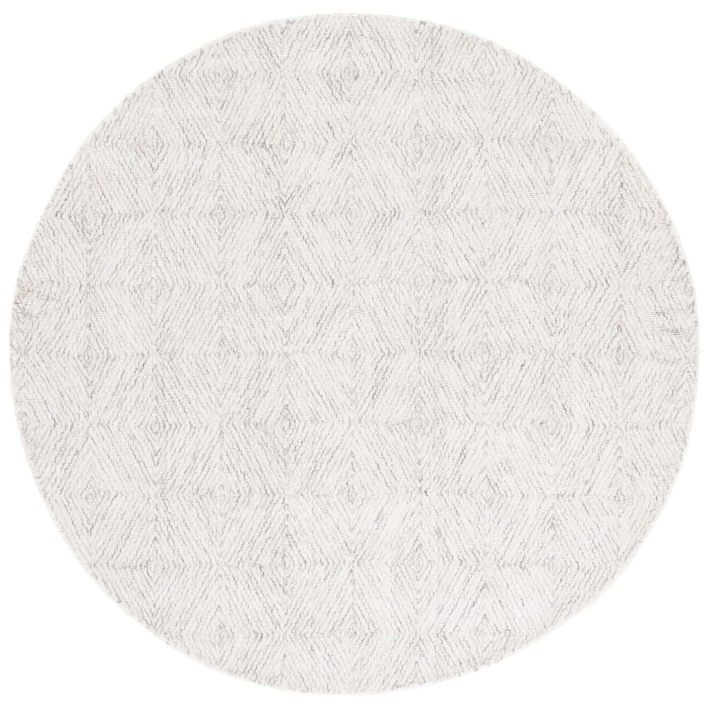 SAFAVIEH Handmade Ebony Herlaug Modern Wool Rug