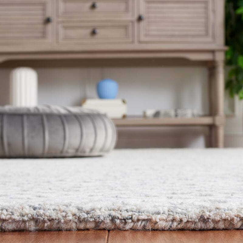 SAFAVIEH, Handmade Ebony Juozapa Modern Wool Rug