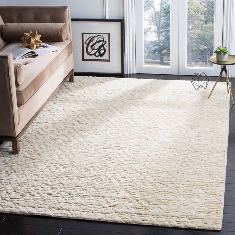 SAFAVIEH Manhattan Sesta Hand-tufted Ivory Wool Area Rug - 6' x 9' - Ivory