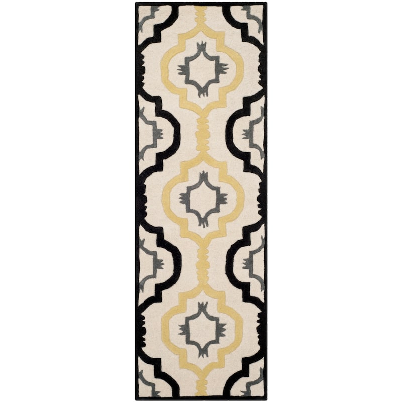 SAFAVIEH Handmade Chatham Vaka Modern Wool Rug