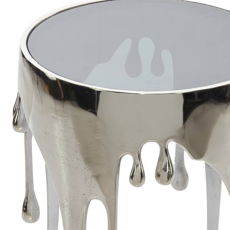 Aluminum Metal Abstract Drip Accent Table with Melting Design and Shaded Glass Top - Roche River Decor