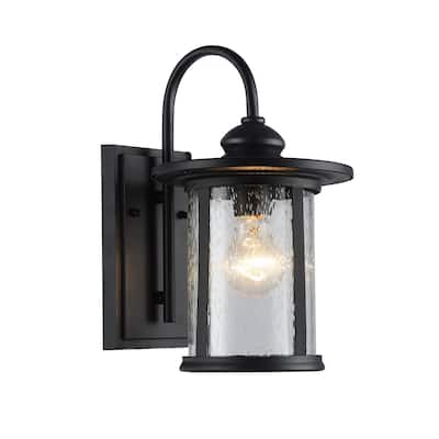 Textured Black 1-Light Outdoor Wall Sconce with Clear Seedy Cylinder Glass Shade