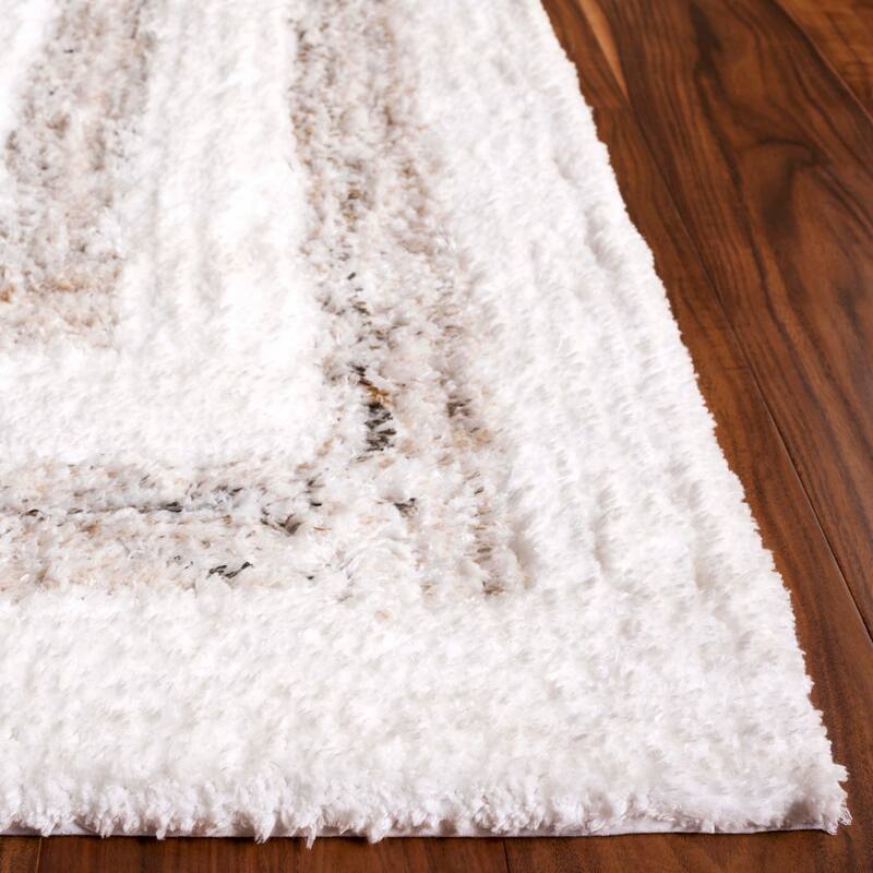 SAFAVIEH Handmade Glory Linett Shag 1.2-inch Thick Rug