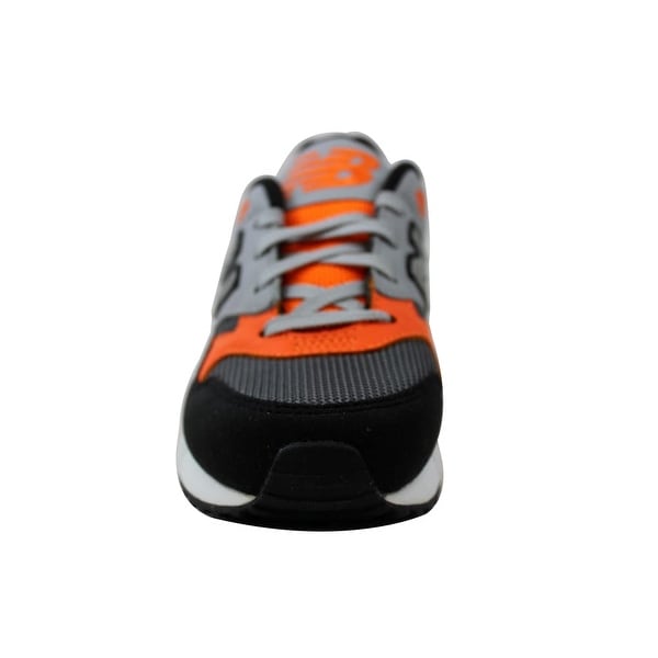 black and orange new balance shoes