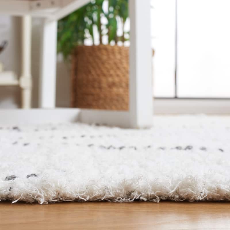 SAFAVIEH Handmade Casablanca Uljana Boho Cotton Fringe Rug