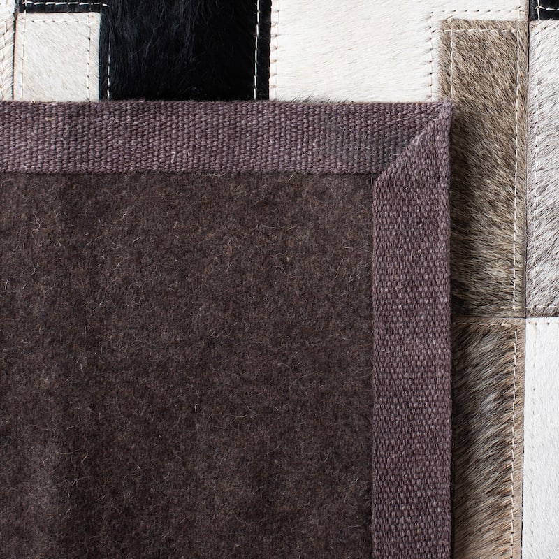 SAFAVIEH Handmade Studio Leather Rengin Modern Leather Rug