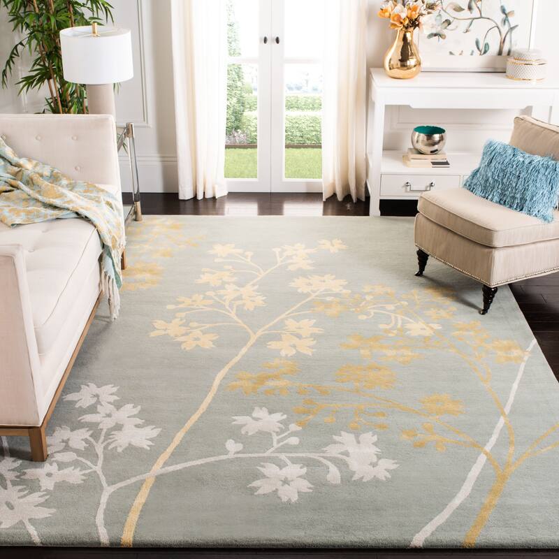 SAFAVIEH Handmade Soho Yessenia N.Z. Wool Rug - 9'6" x 13'6" - Light Blue/Multi