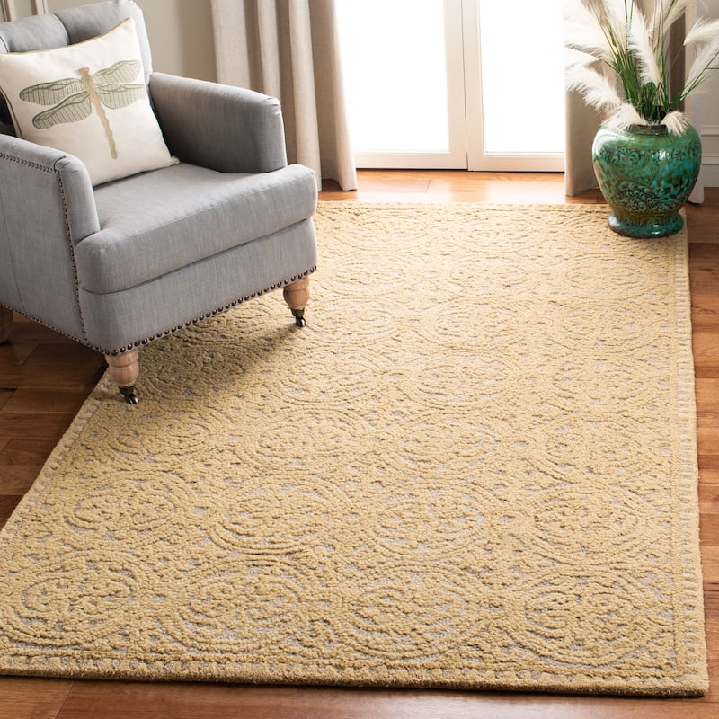 SAFAVIEH Handmade Cambridge Friedhild Moroccan Wool Rug - 10' x 14' - Light Gold/Dark Gold