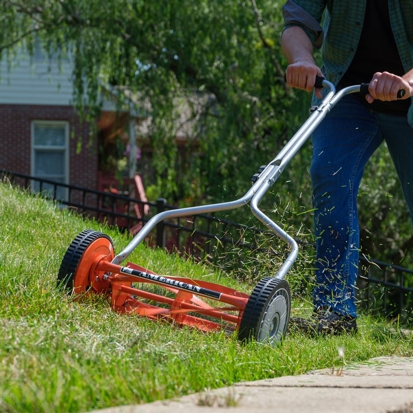 Push reel outlet mower