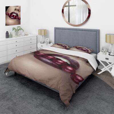 Designart 'Woman Bitting With Red Lips With Red Pearls' Modern Duvet Cover Comforter Set